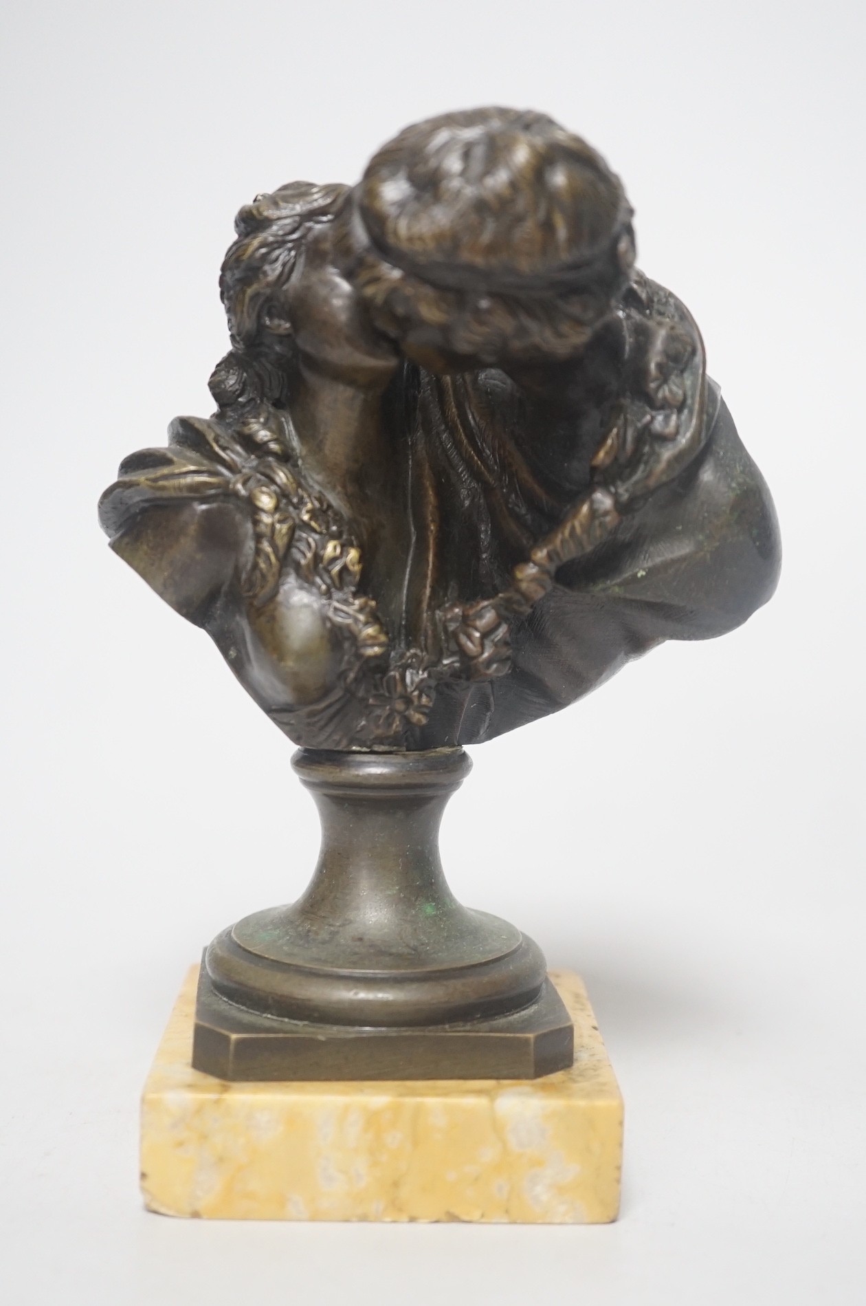 After Jean-Antoine Houdon (1741-1828), 'Le Baiser Donné' (The Kiss Bestowed], a 19th-century patinated bronze figure group, on a square Siena marble base, 16cm tall